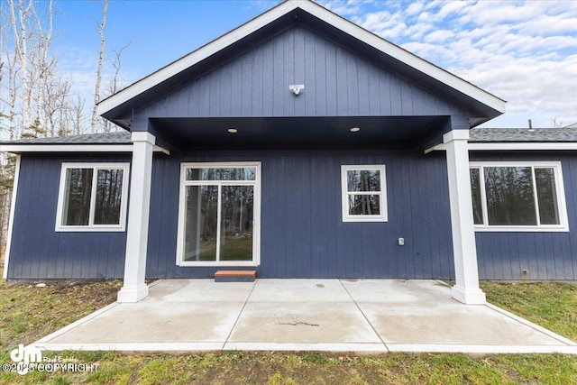 rear view of property with a patio