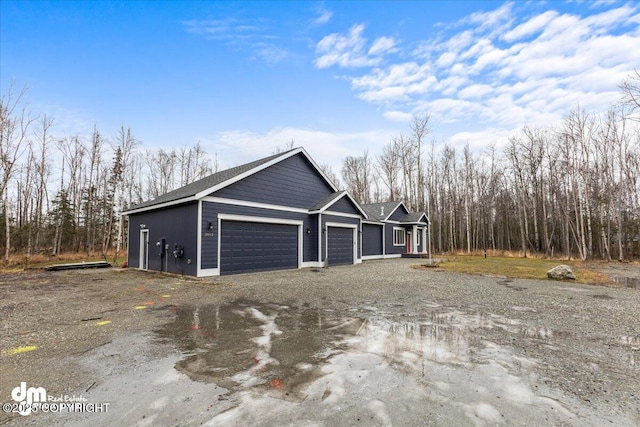 view of property exterior featuring a garage