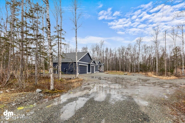 view of yard featuring a garage