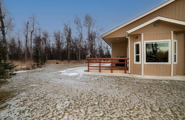 view of yard covered in snow