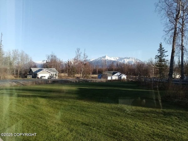 view of yard with a mountain view