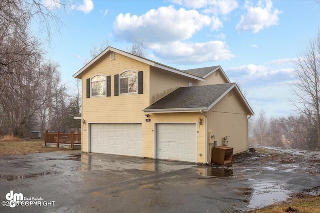 view of home's exterior with a garage