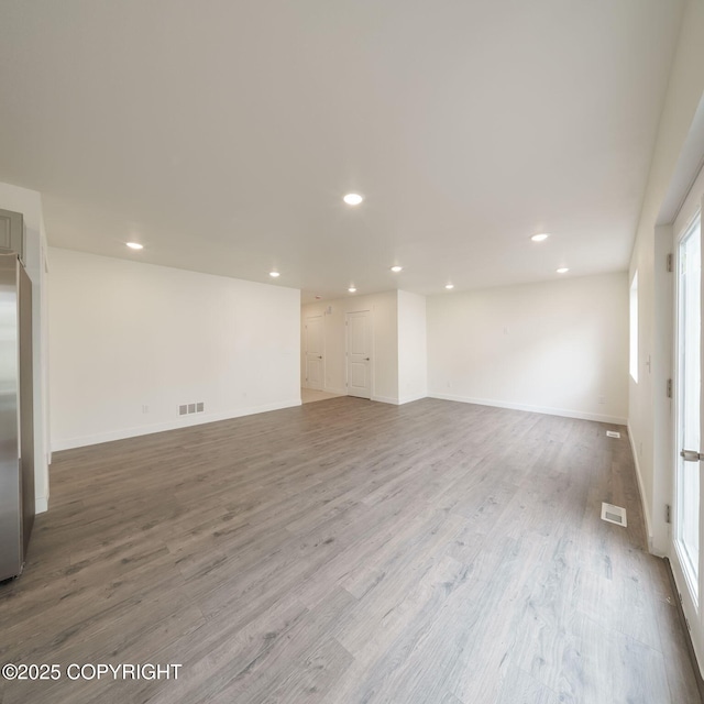 445 Idaho St, Anchorage, AK 99504 - empty room featuring recessed lighting and wood finished floors