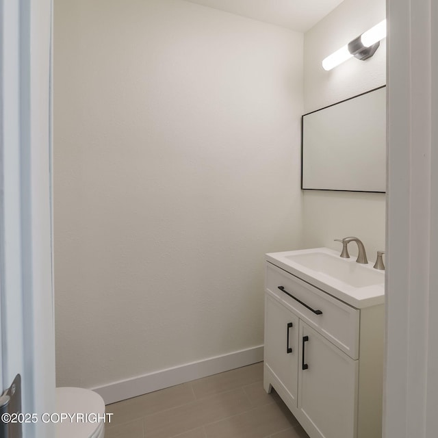 445 Idaho St, Anchorage, AK 99504 - half bathroom with vanity and tile patterned floors