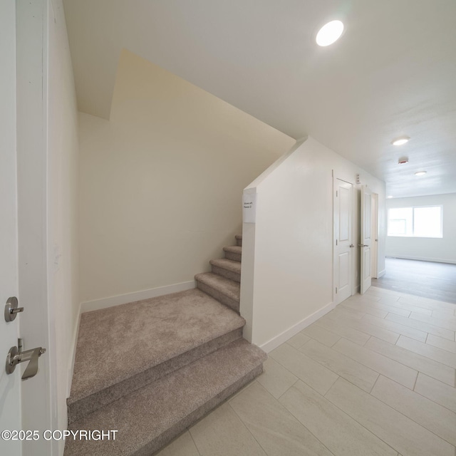 445 Idaho St, Anchorage, AK 99504 - staircase featuring recessed lighting
