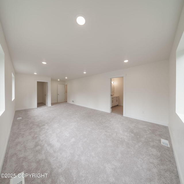 445 Idaho St, Anchorage, AK 99504 - carpeted spare room with recessed lighting and baseboards