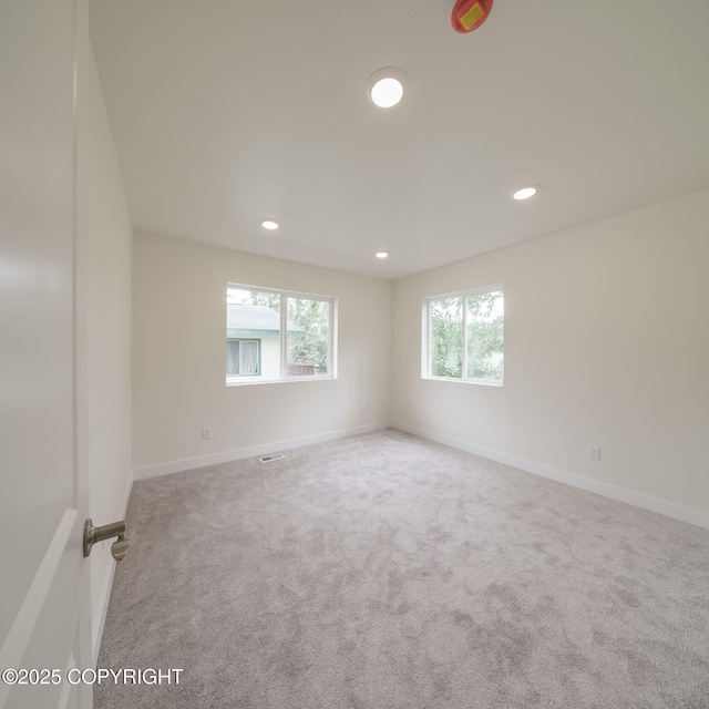 445 Idaho St, Anchorage, AK 99504 - empty room featuring carpet floors and recessed lighting