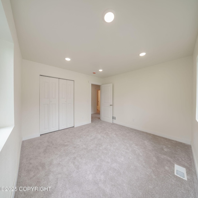 445 Idaho St, Anchorage, AK 99504 - unfurnished bedroom with carpet, recessed lighting, and a closet