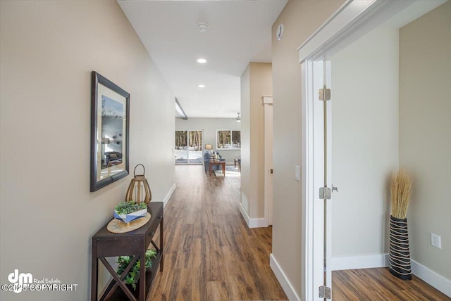 hallway featuring hardwood / wood-style flooring