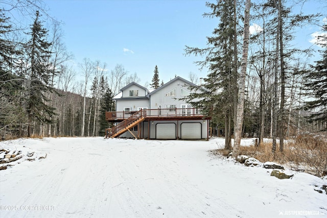 view of front of house with a wooden deck