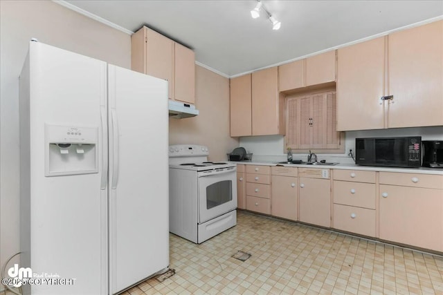 kitchen featuring white appliances, ornamental molding, light brown cabinetry, and sink