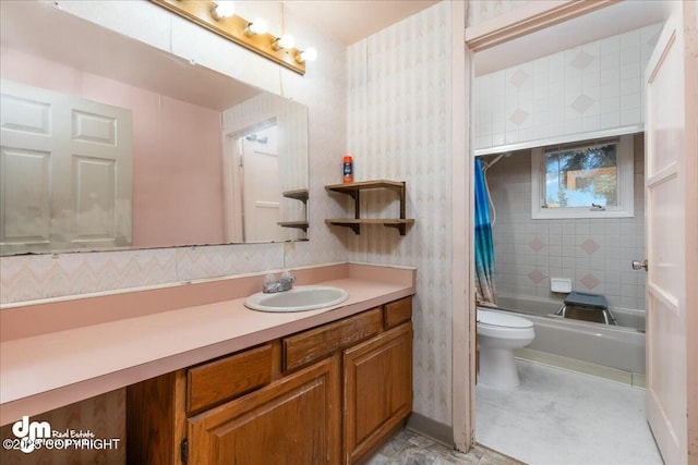 full bathroom with vanity, toilet, and combined bath / shower with glass door