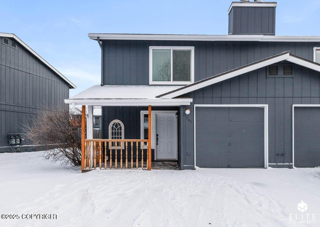 view of front of home with a garage