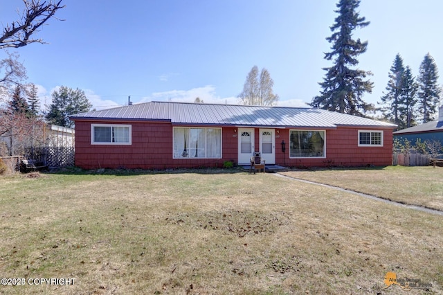 single story home with a front yard