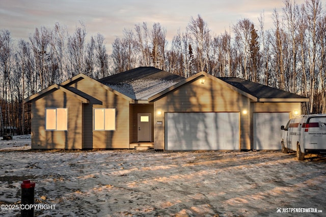 view of front of property featuring a garage