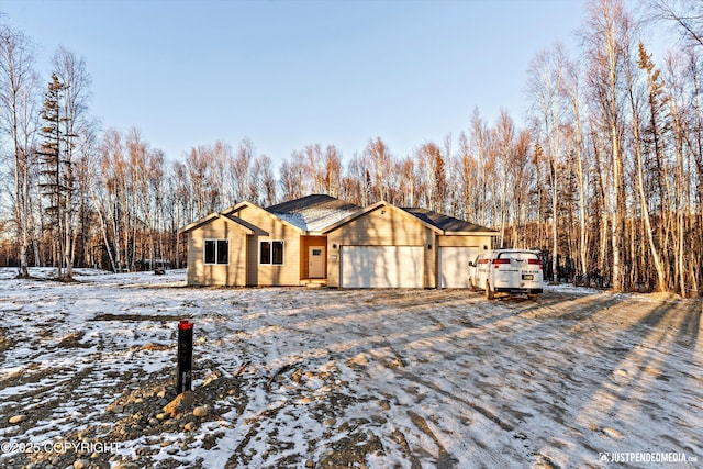 ranch-style home with a garage