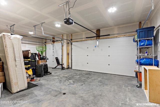 garage featuring a garage door opener