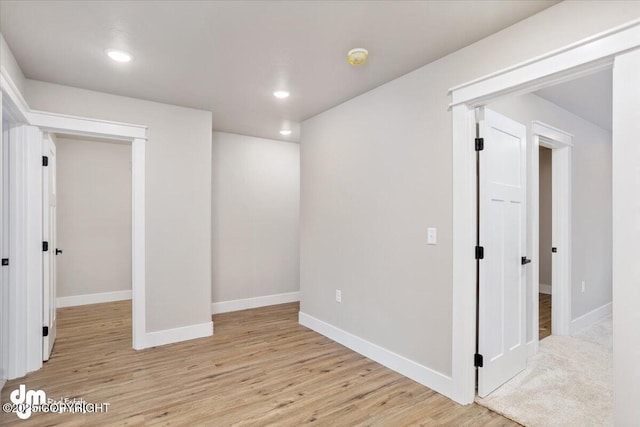 spare room featuring light hardwood / wood-style flooring