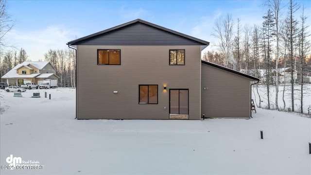 view of snow covered house