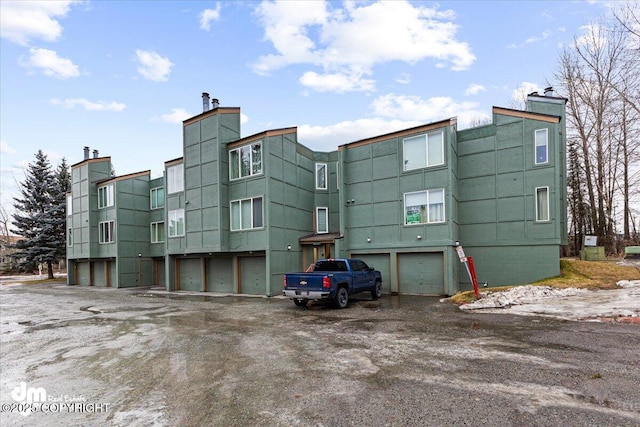 view of building exterior with a garage