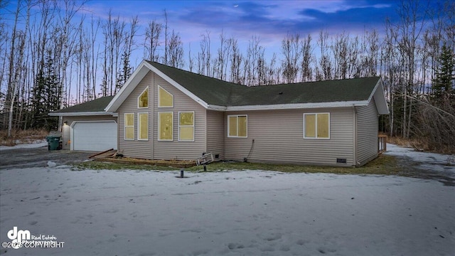 exterior space with a garage