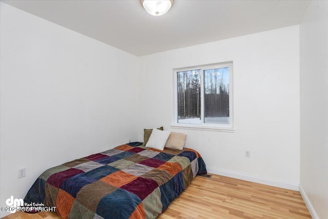 bedroom featuring wood-type flooring