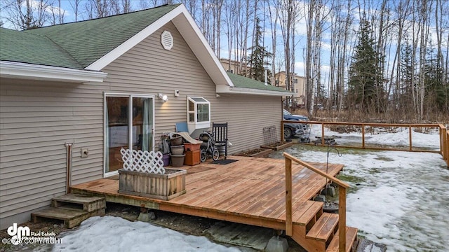 view of snow covered deck