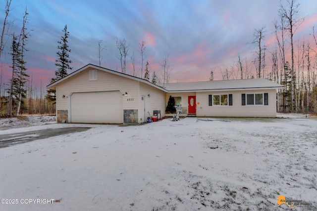 ranch-style house with a garage