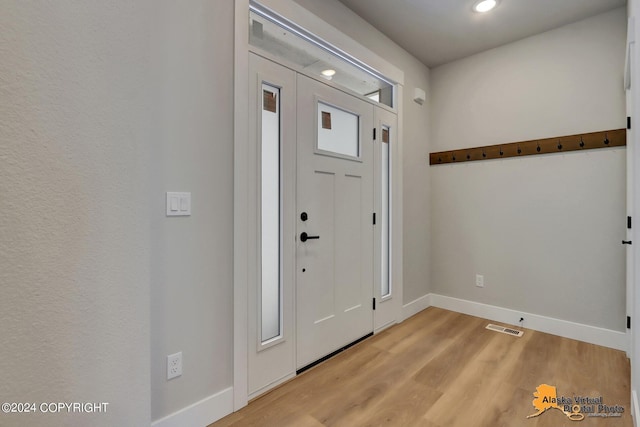 entrance foyer with light wood-type flooring