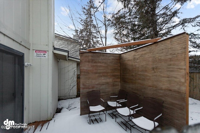 view of snow covered patio