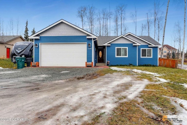 view of front of house with a garage