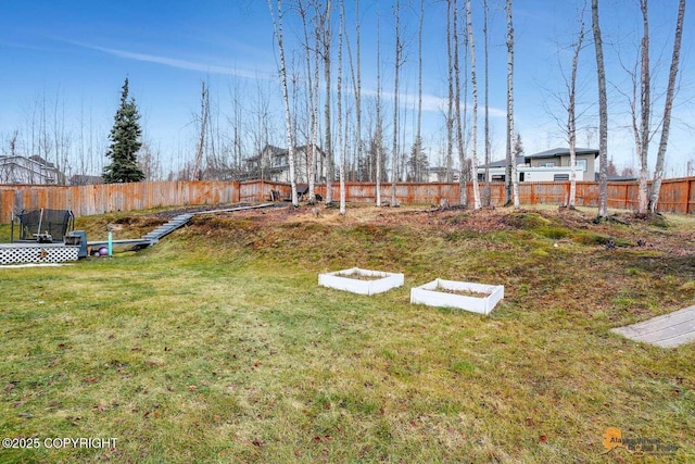 view of yard featuring a trampoline