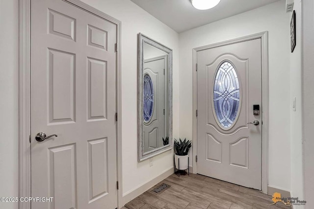 foyer entrance featuring light hardwood / wood-style floors