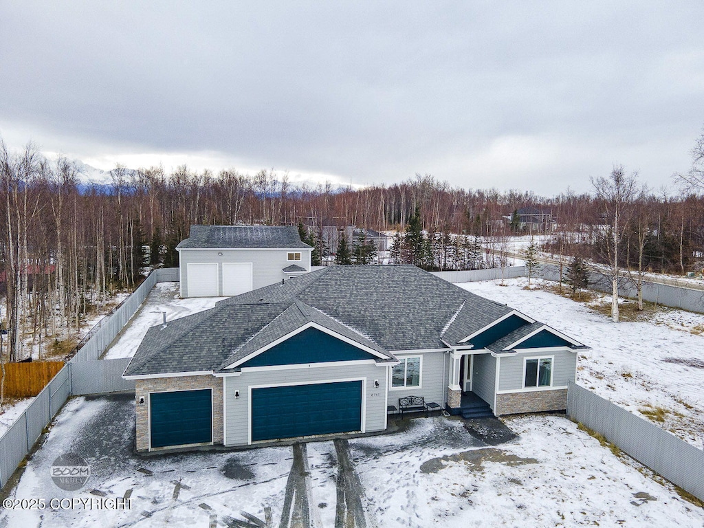 view of front of property with a garage