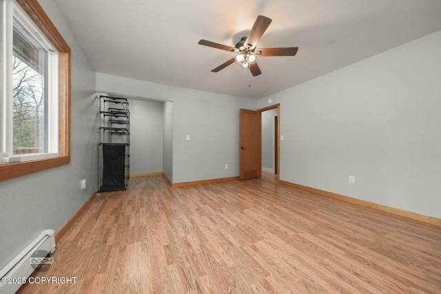 unfurnished living room with ceiling fan, light hardwood / wood-style flooring, and a baseboard radiator