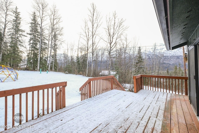 view of snow covered deck