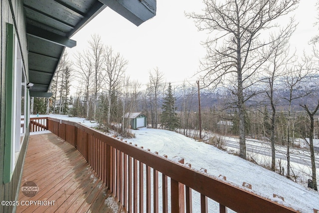 view of snow covered deck