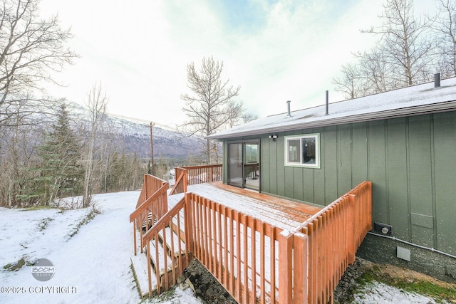 view of snow covered deck