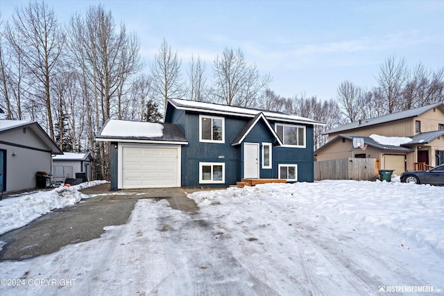 view of front of property featuring a garage