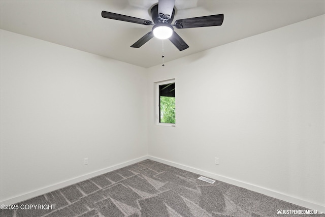 unfurnished room with carpet floors