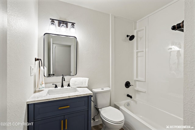 full bathroom featuring toilet, shower / bath combination, and vanity