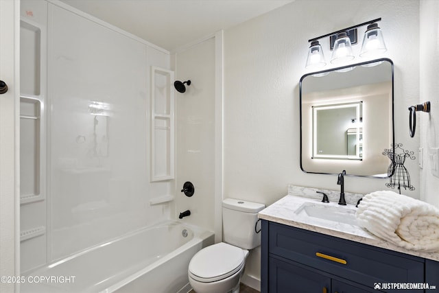 full bathroom with toilet, bathtub / shower combination, and vanity