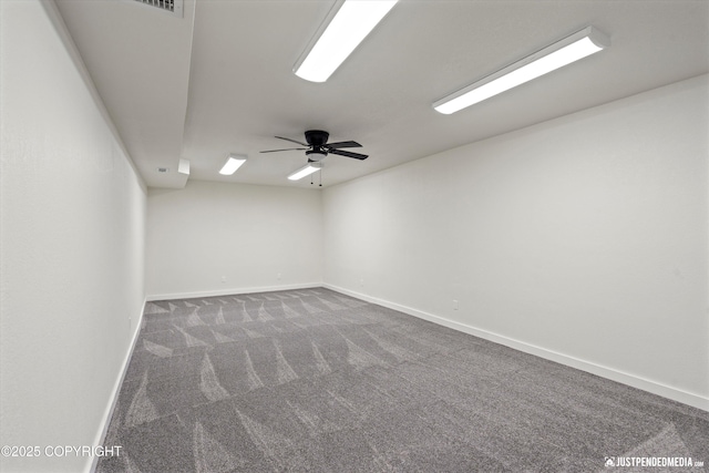 empty room featuring ceiling fan and carpet flooring