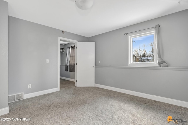 unfurnished bedroom featuring carpet floors