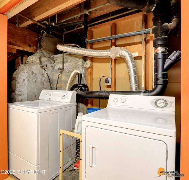 laundry room featuring separate washer and dryer