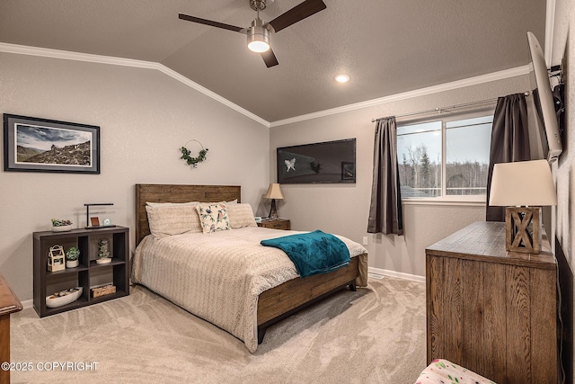 bedroom featuring ceiling fan, lofted ceiling, carpet flooring, and ornamental molding