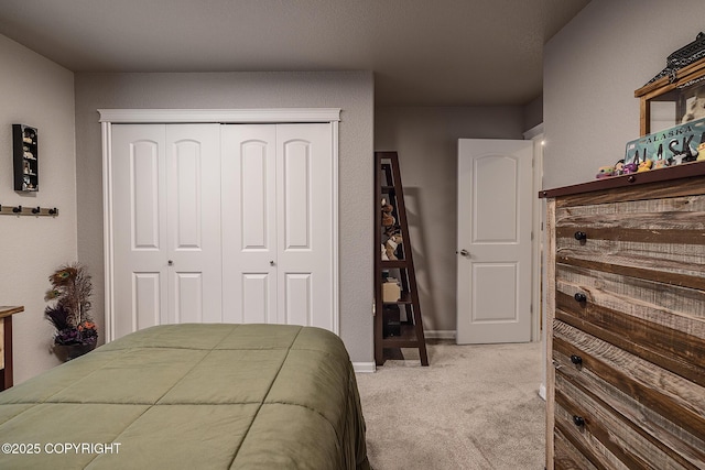 carpeted bedroom with a closet