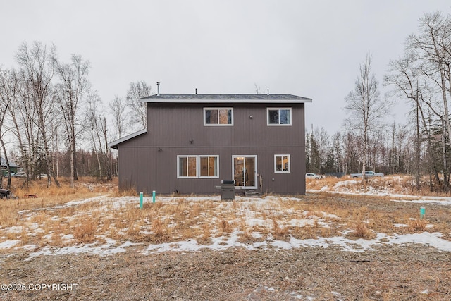 view of snow covered house