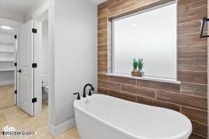 bathroom with a bathing tub