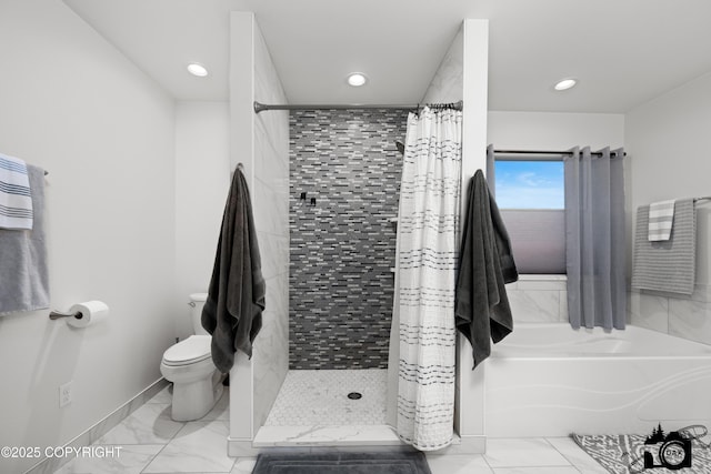 bathroom with toilet and separate shower and tub